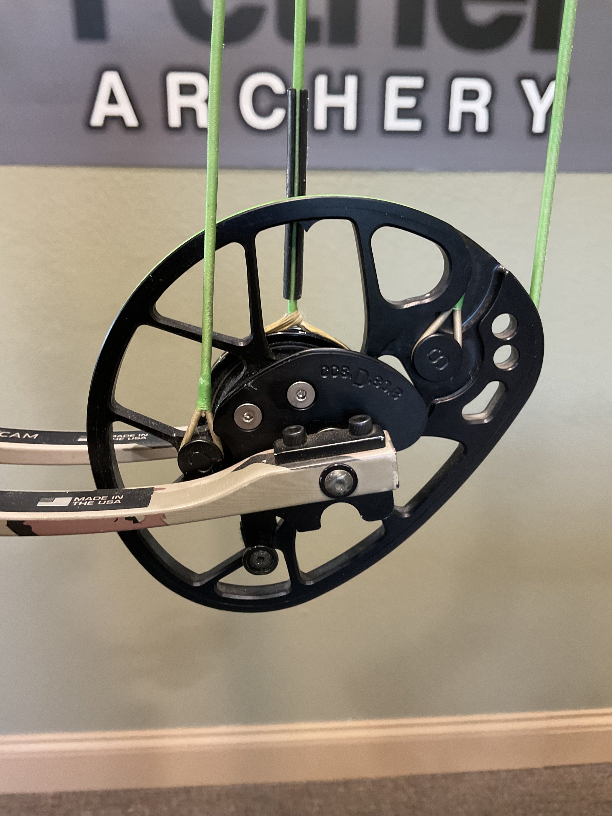 Mathews Archery Cam wheel on a compound bow.