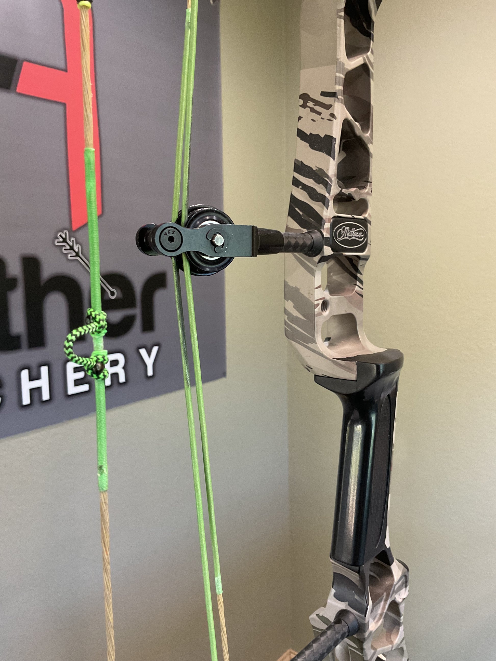 Used Mathews bow image with D-Loop and roller guard.