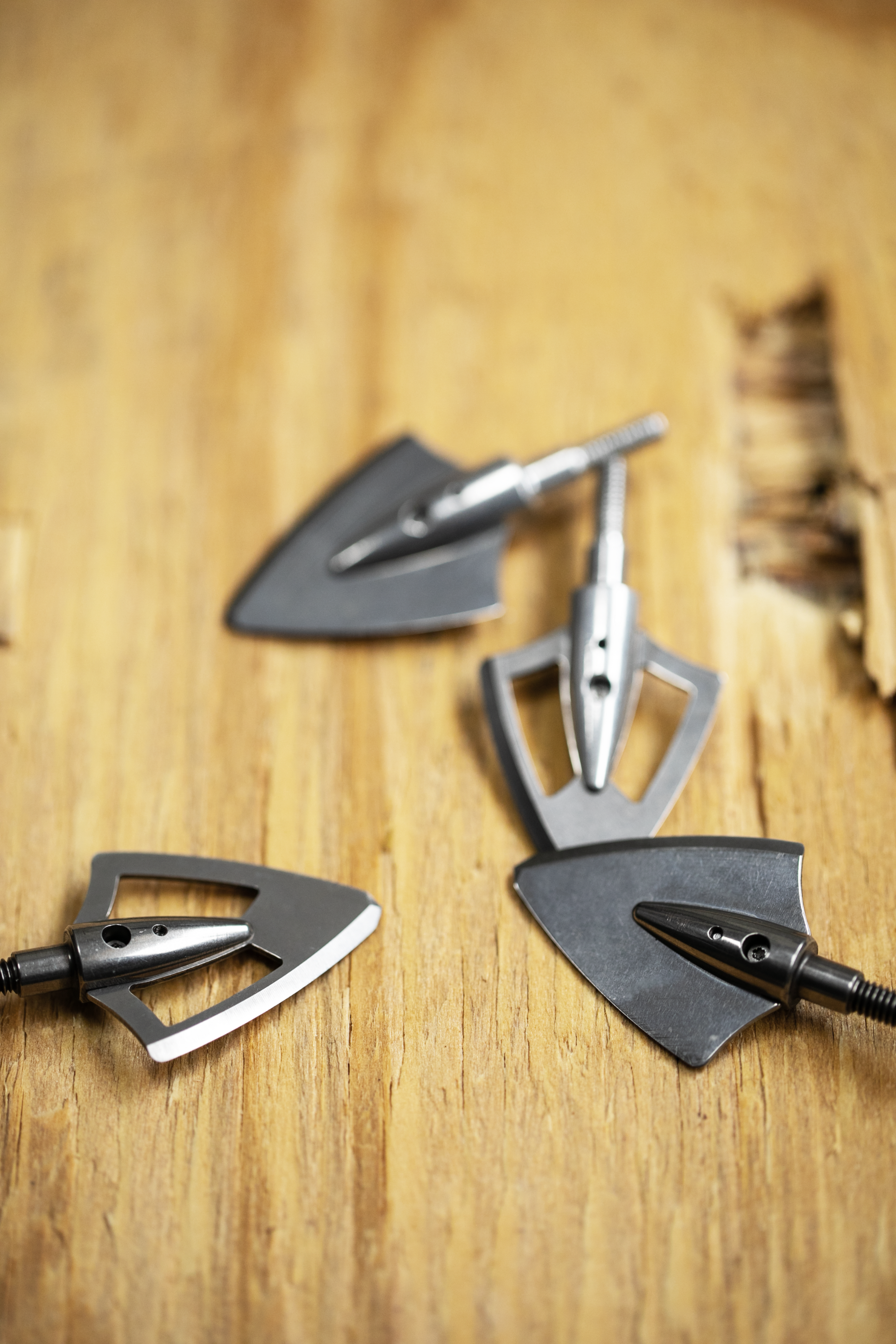 Slick Trick SB single bevel broadheads displayed on table showing 100gr 125gr 150gr and 175gr grain weight options for bowhunting